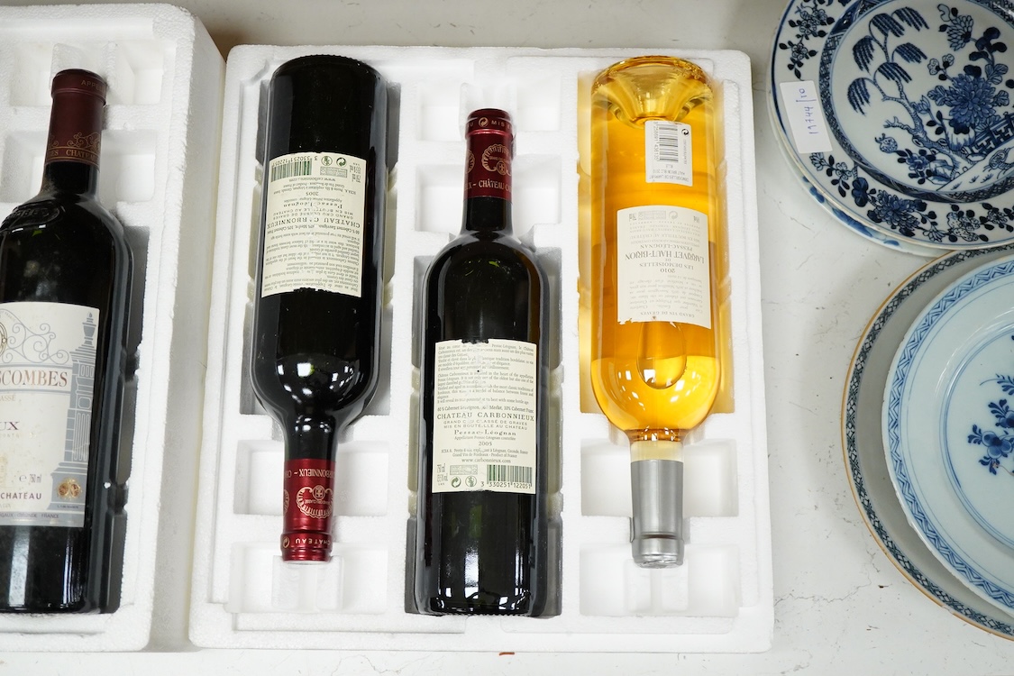Six bottles of mixed wines, including a bottle of Margaux, Chateau-Lascombes grand cru 2000, a bottle of Larrivet Haut Brion, 2010, two bottles of Chateau Carbonnieux grand cru 2005, a bottle Chateau Grand- Pontet grand